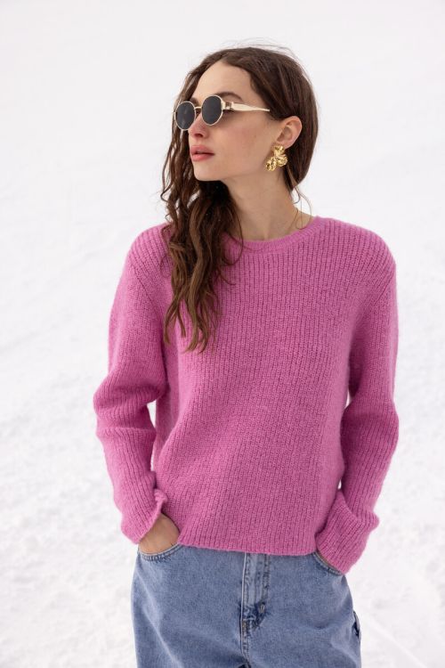 Roze gebreide trui met strikken