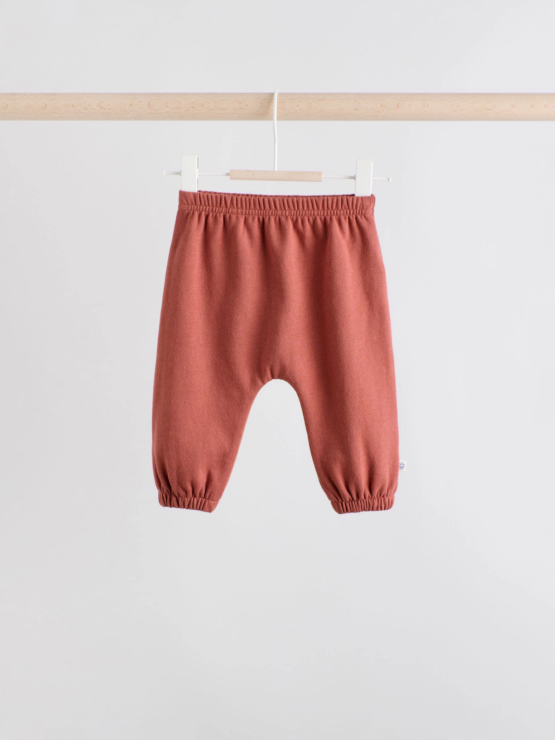 Blauwe gezichten met dambordmotief - Set van fleece top en joggingbroek voor baby's (0mnd -2jr)
