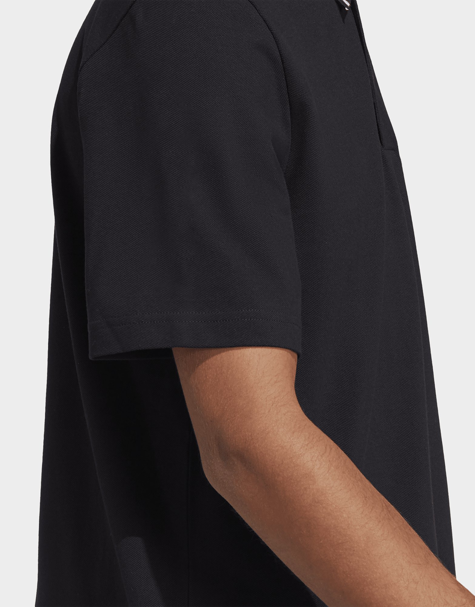 adidas Polo à petit logo en piqué Essentials