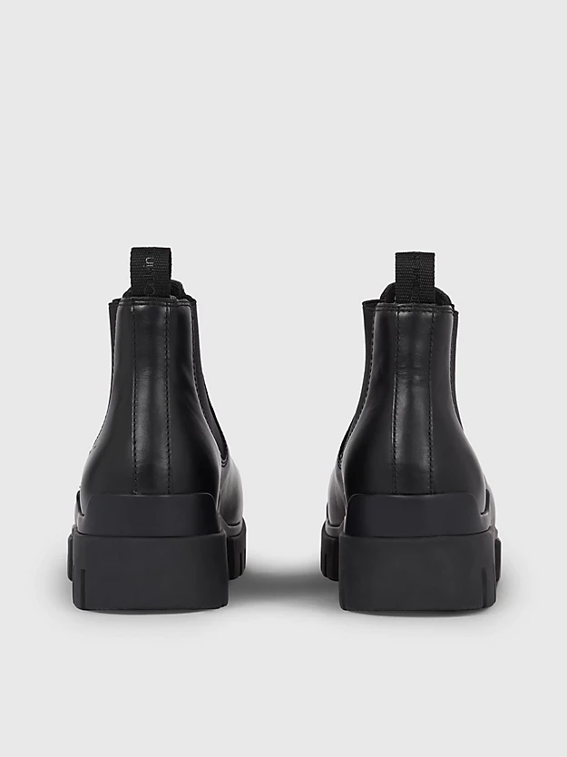 botas de couro até o tornozelo