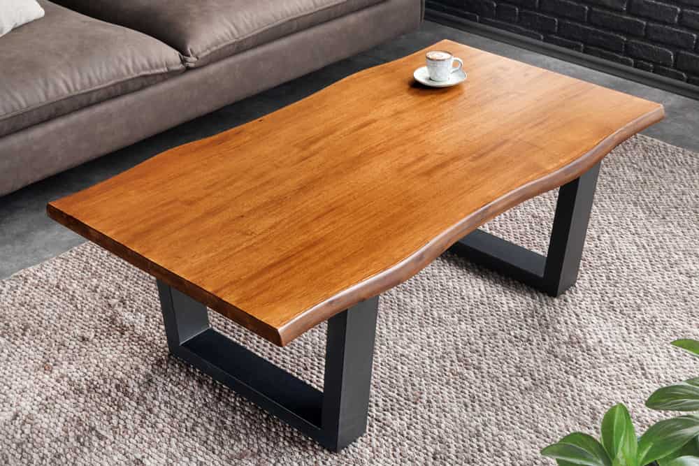 Massiver Couchtisch GENESIS 110cm braun Akazienholz Baumkante V-Gestell