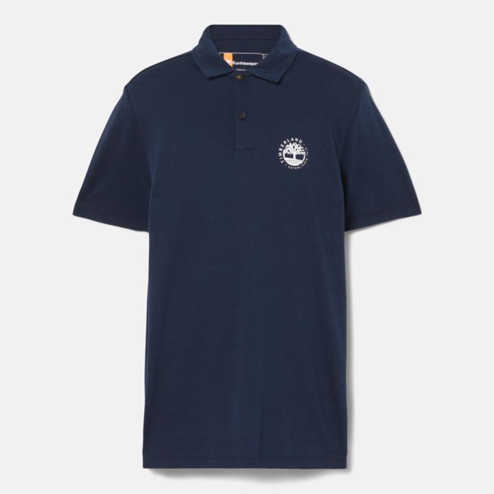 Polo masculina com tecnologia Refibra e logo na cor azul marinho.