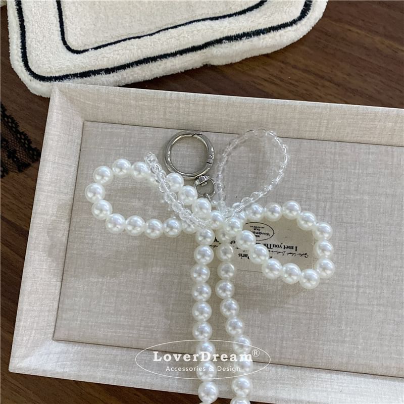 BeDaisy - Sleutelhanger met strik en imitatieparelkant