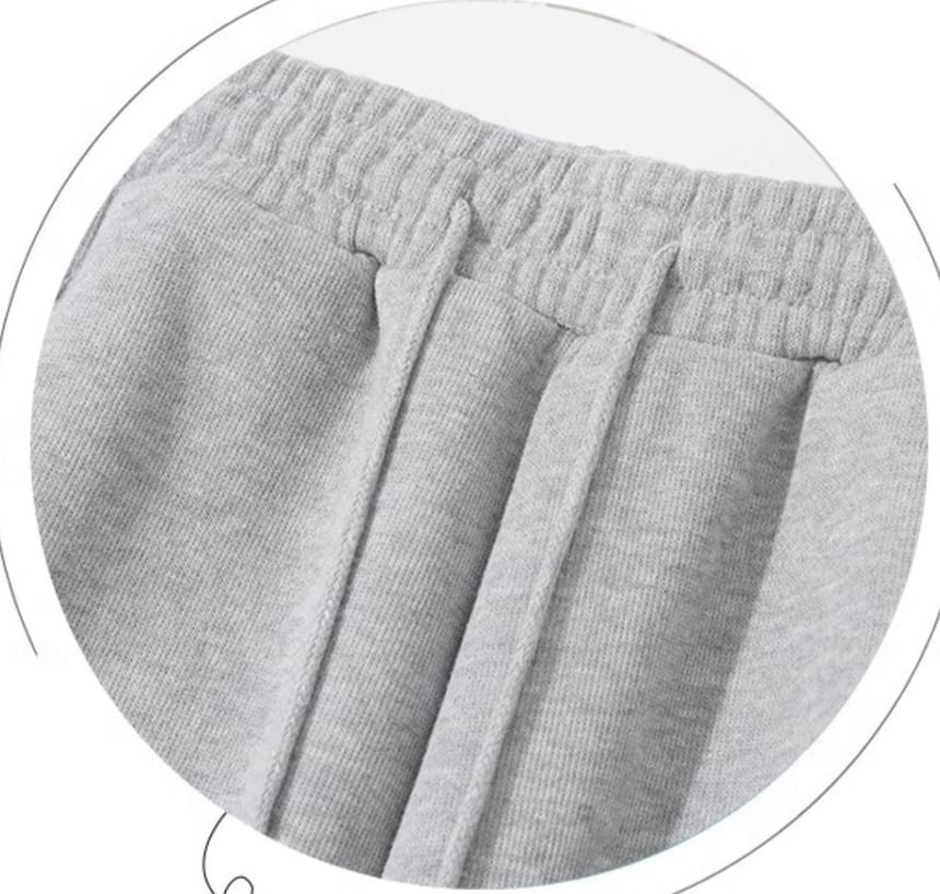 evanesce - Effen joggingbroek met hoge taille, wijde pijpen en chenillevoering