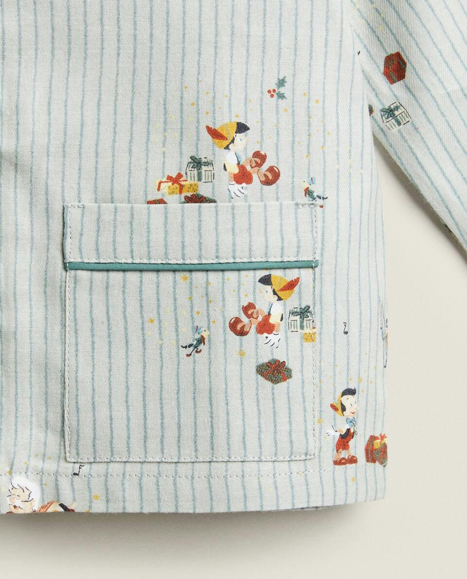 Pijama infantil de flanela com estampa de Natal do Pinóquio da Disney.