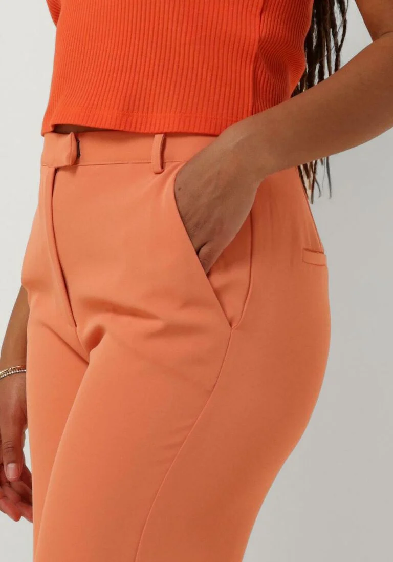 ANOTHER LABEL oranje another label pantalon doore pants