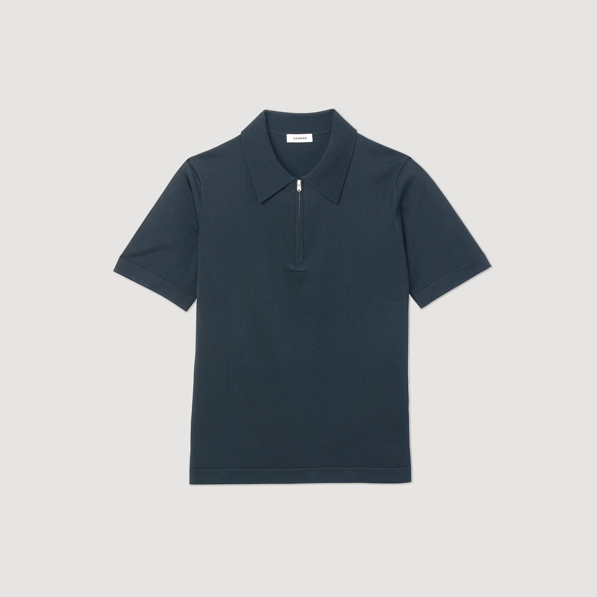 Polo en maille á col zippe