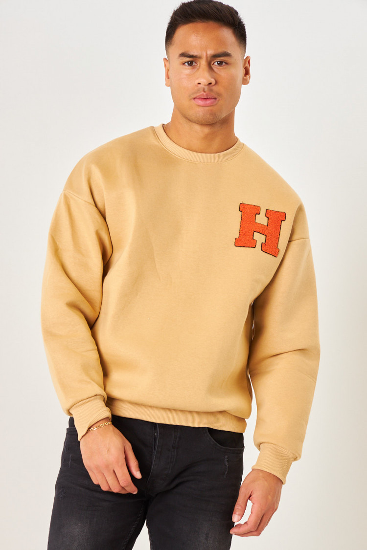 Sweat beige foncé à écusson 