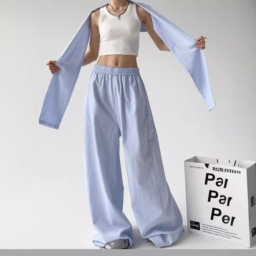 Rosesand - Gestreepte, losse, wijde broek met lage taille