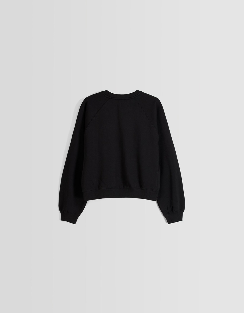 Moletom com mangas raglan