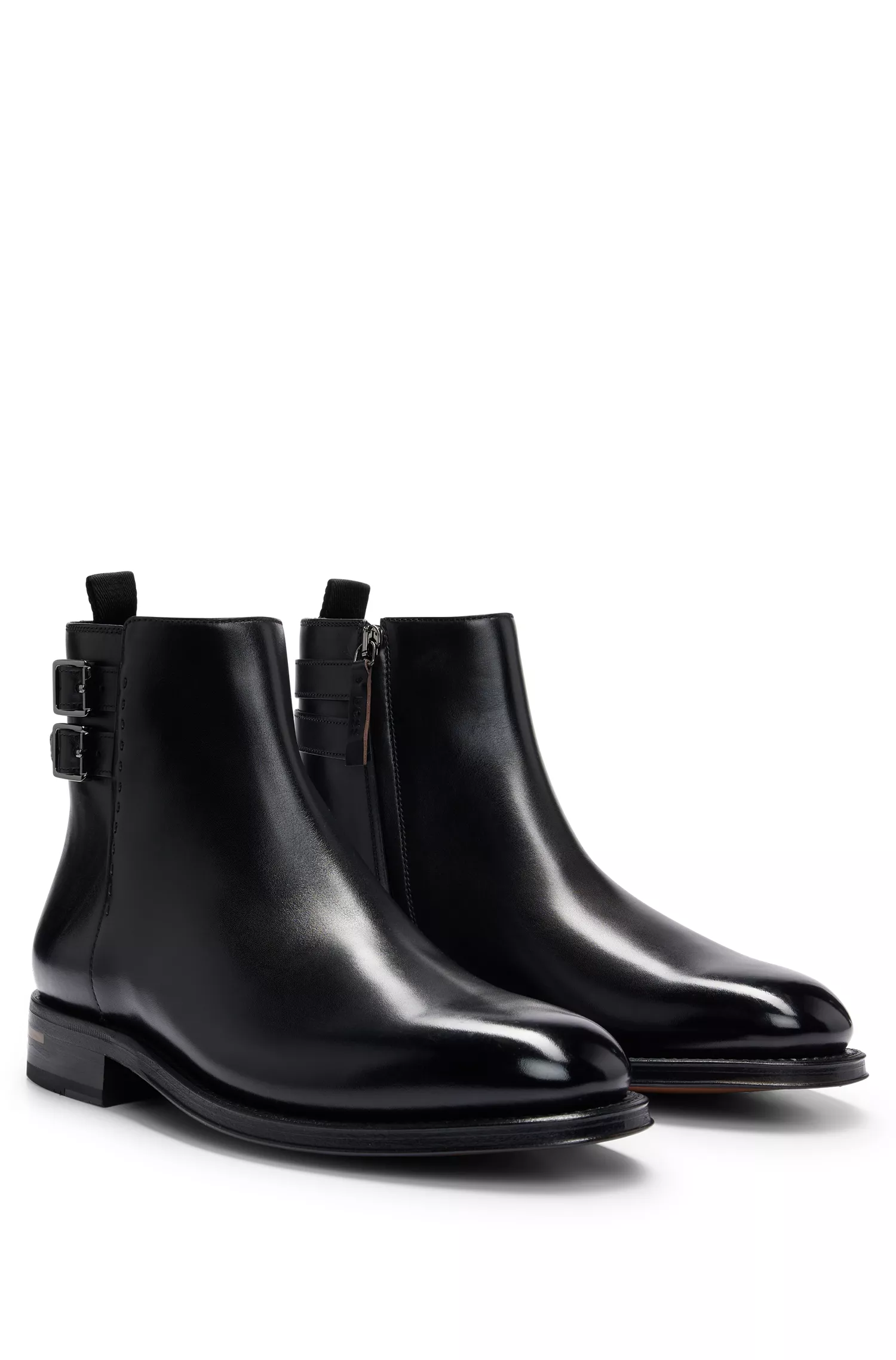 Botas BOSS em couro preto polido com palmilha acolchoada e tira dupla.