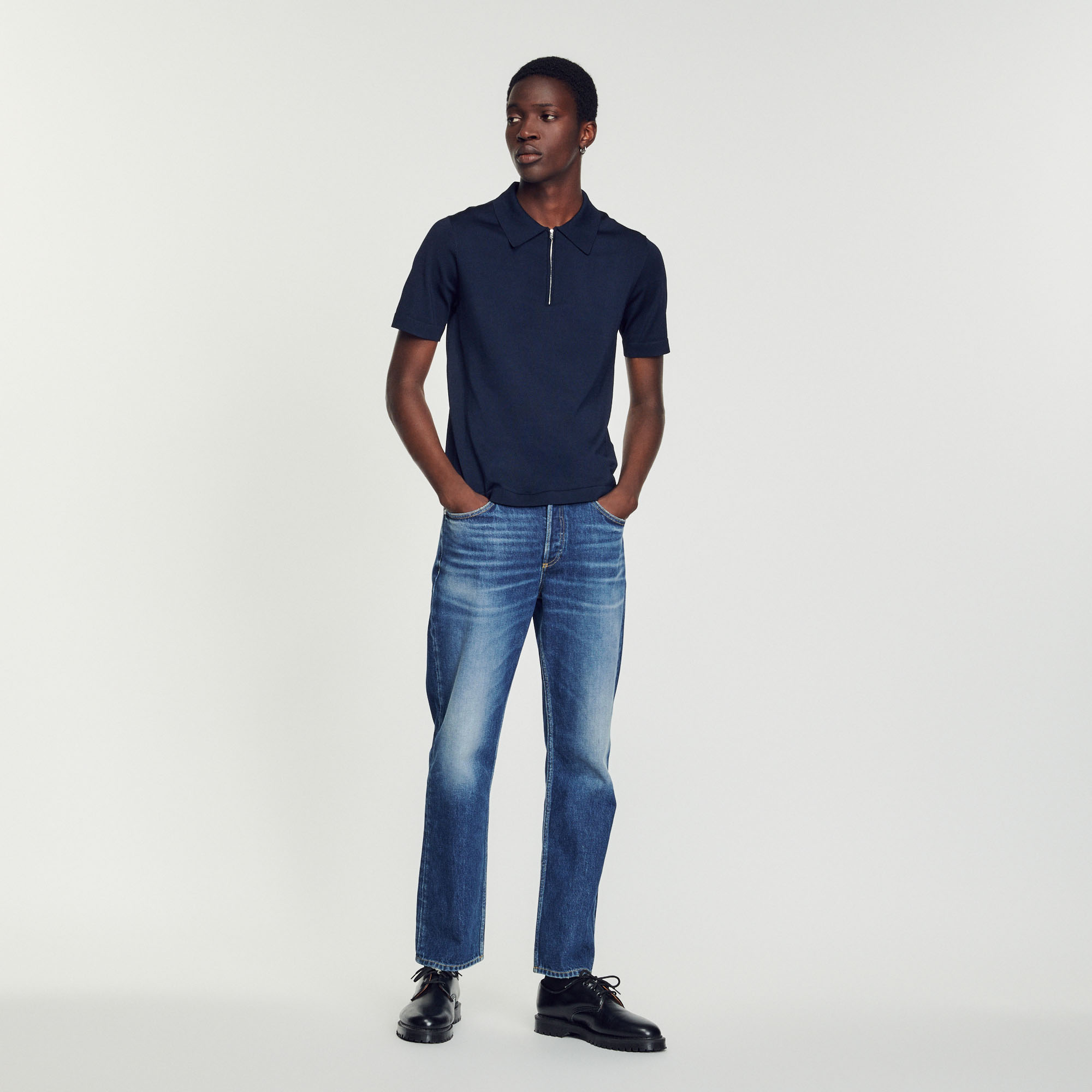Polo en maille á col zippe