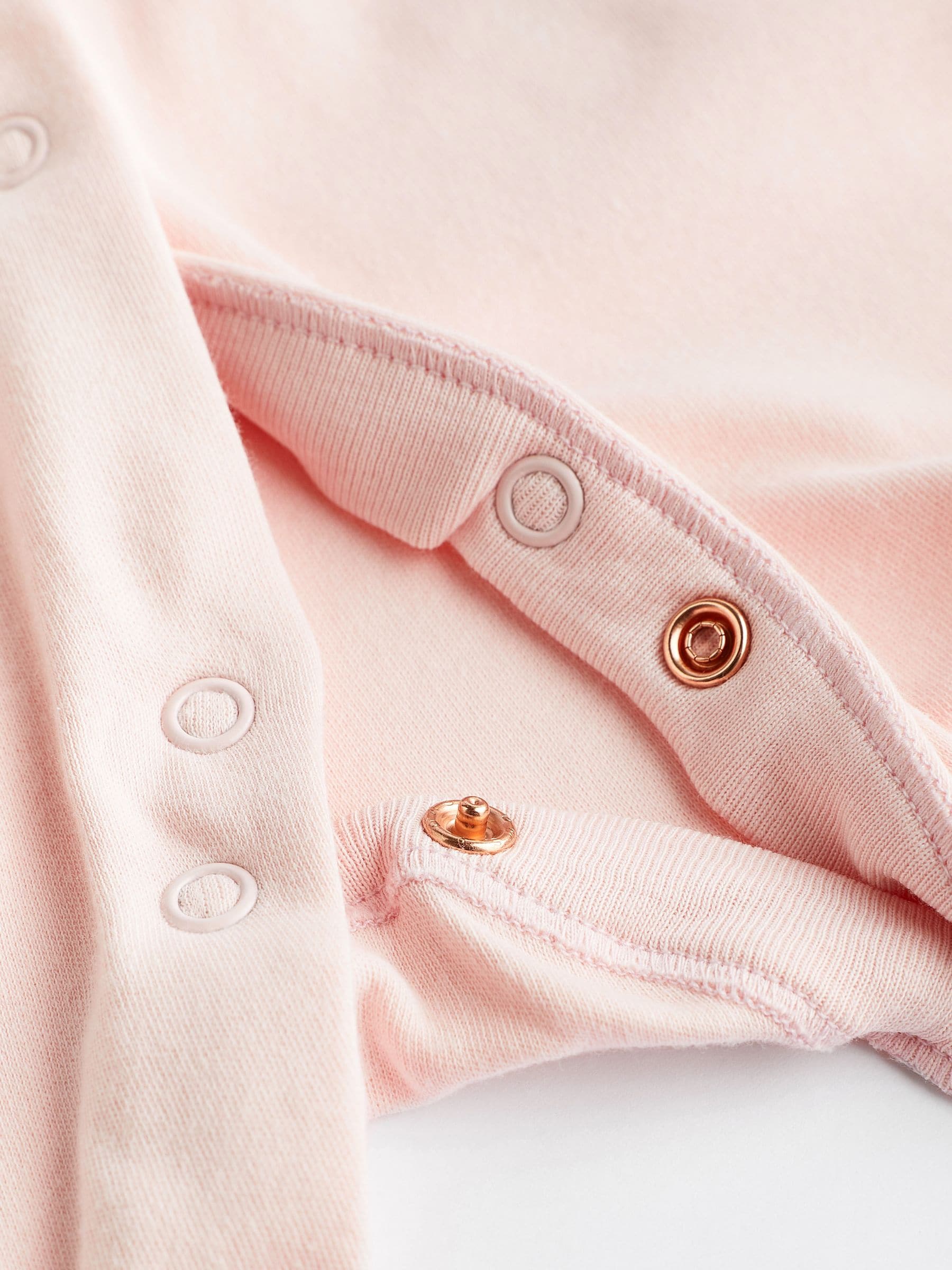 Roze/wit - Babypyjama's (0-2 jr)