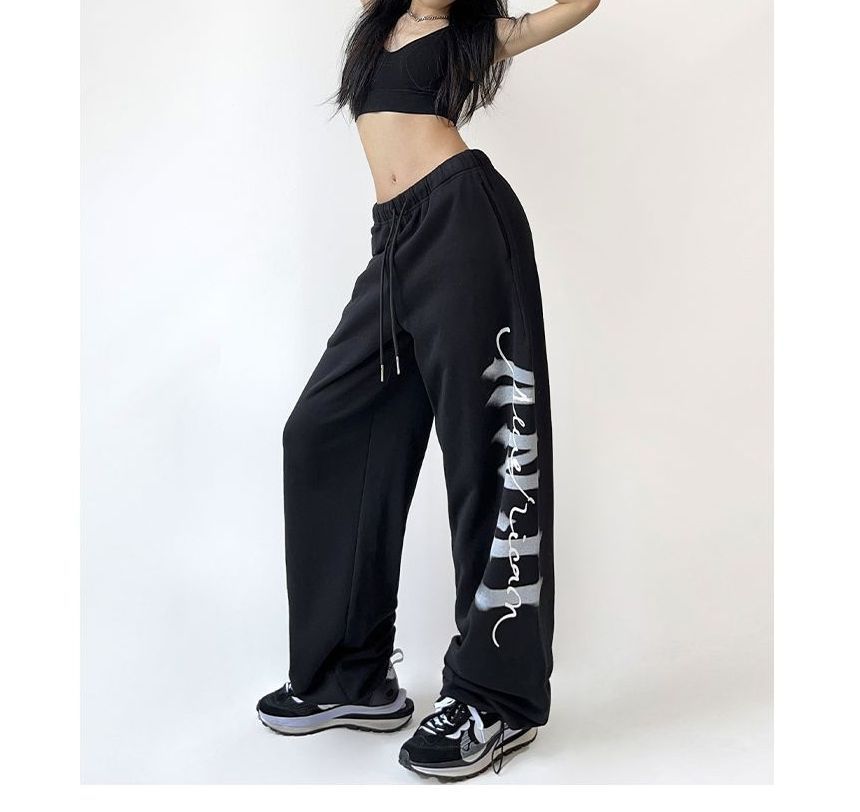 Bolgivy - Lage joggingbroek met trekkoord en wijde pijpen en tekstprint
