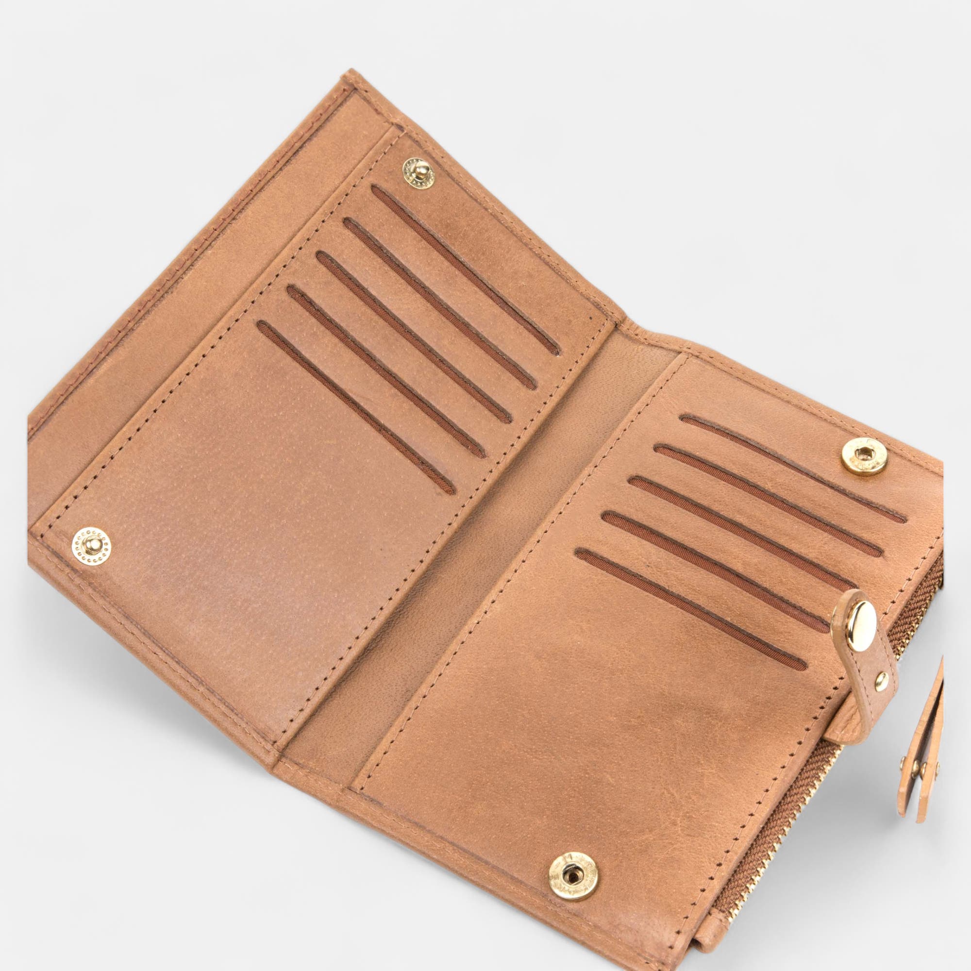 Petite maroquinerie en cuir cognac