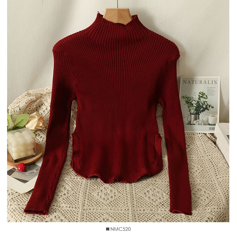 Lemongrass - Asymmetrische gebreide top met hoge hals