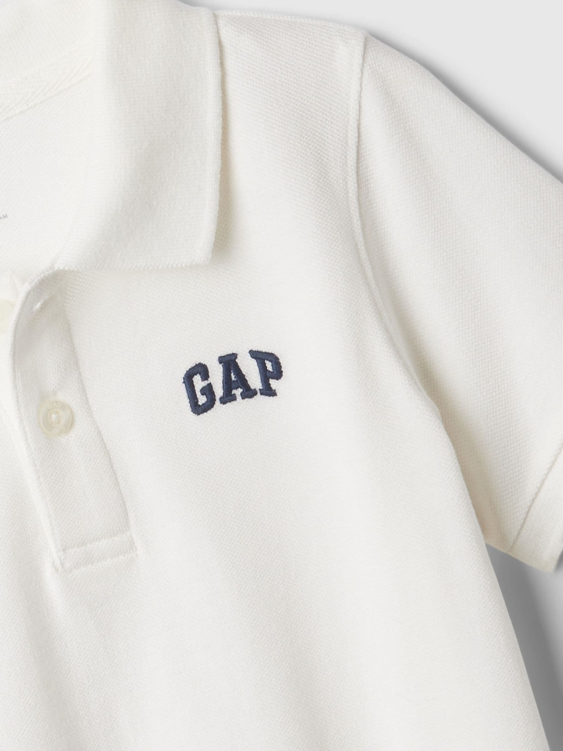 Wit - Gap piqué poloshirt met korte mouwen en logo (pasgeboren baby-5 jr)
