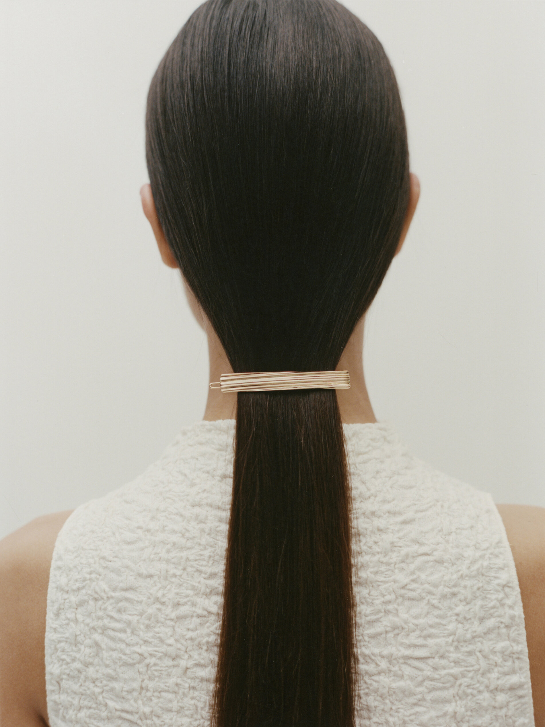 Presilha de cabelo texturizada banhada a ouro - DOURADA