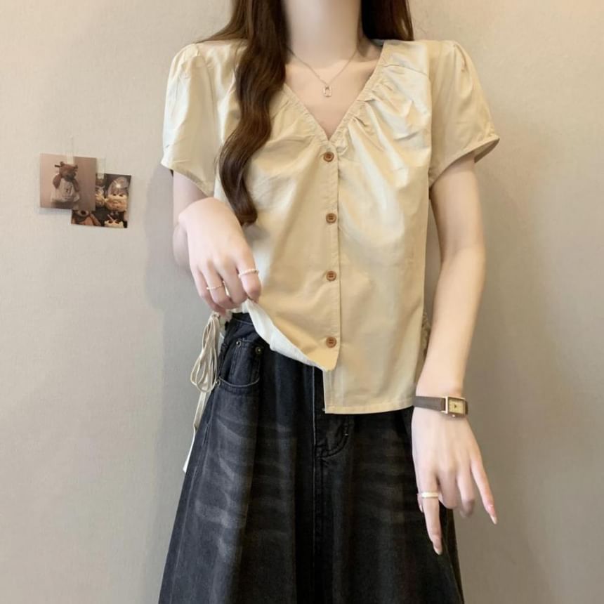 Sisyphi - Blouse met korte mouwen, V-hals en knoopjes