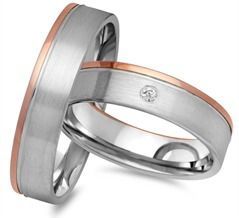 Trouwringen 8 karaat rood-wit goud met Diamant