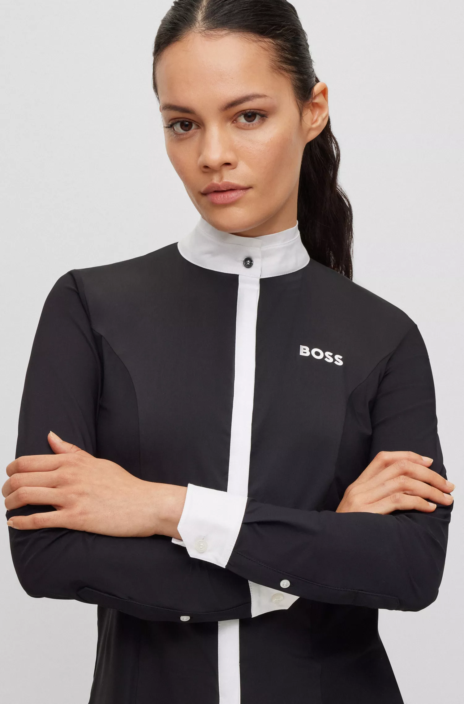 Blusa de competição BOSS Black-Equestrian de corte justo, em tecido misto.
