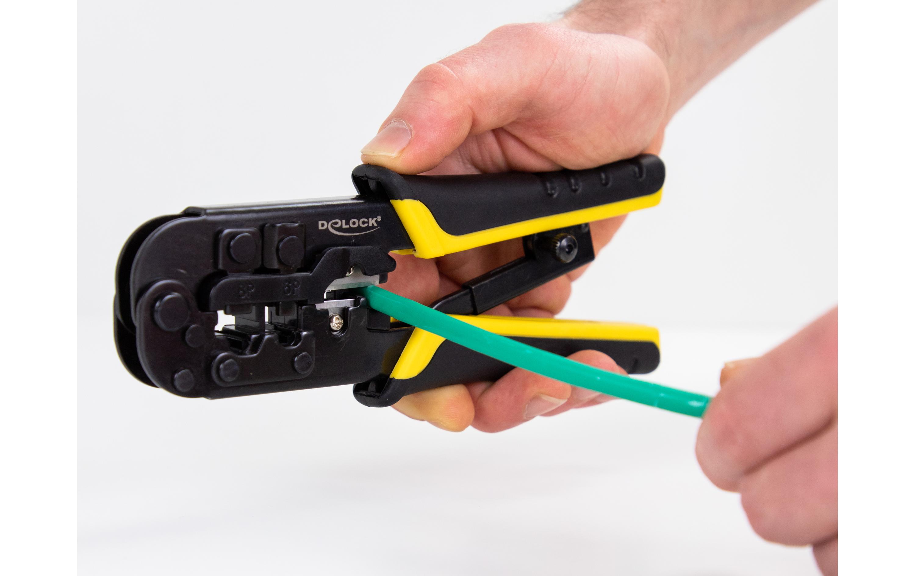 Crimpzange Universell mit AbisoliererDelock Universelle Crimpzange mit Abisolierer für 8P (RJ45), 6P (RJ12/11) oder 4P Stecker