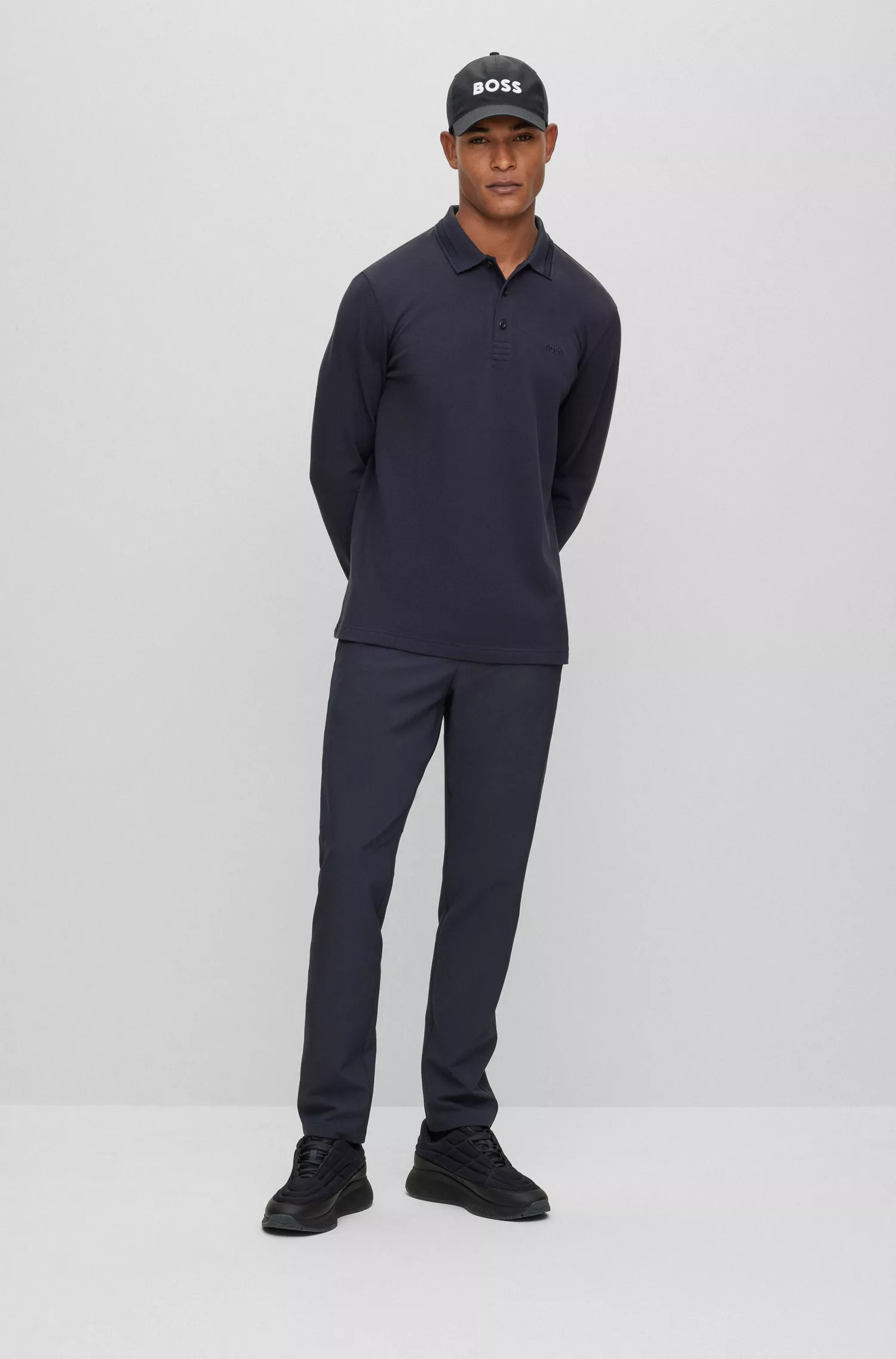 Camisa polo BOSS verde de manga comprida em piqué de algodão com logotipo contrastante.