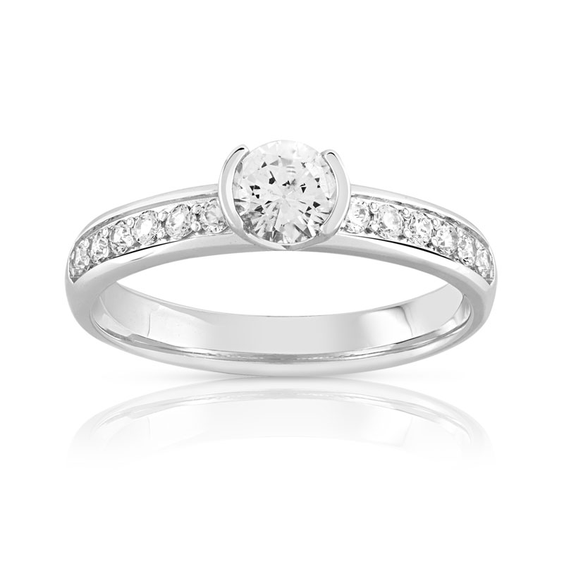 Bague solitaire or 750 blanc diamant 60/100e de carat