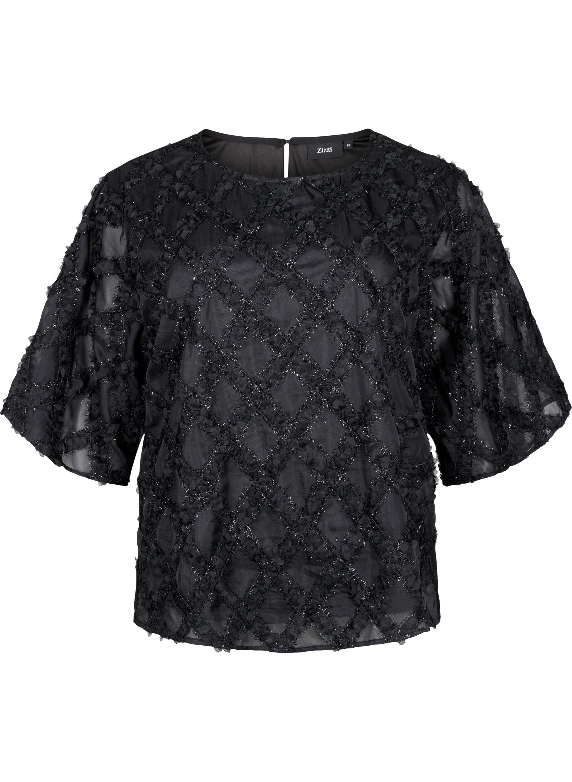 Bluse med harlequin mønster