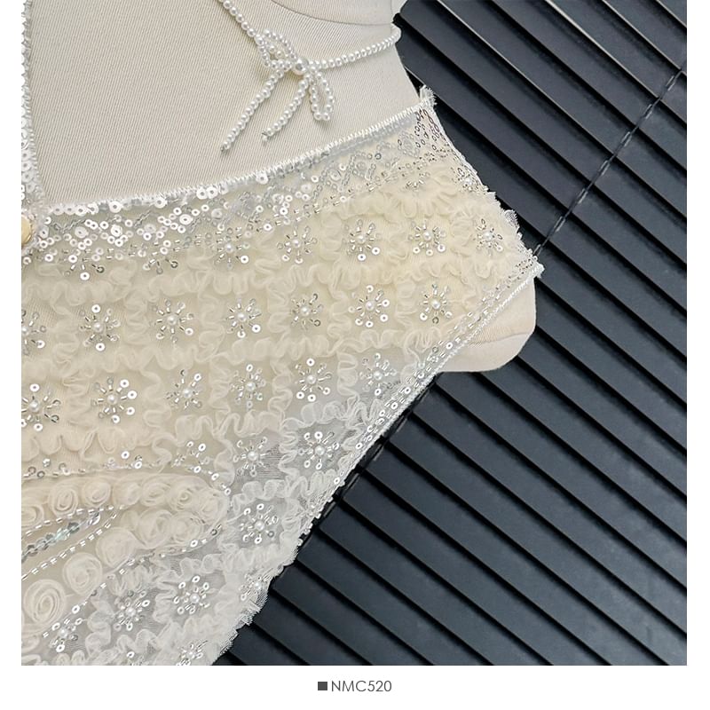 Lemongrass - Mesh vest met pailletten en knoopjes