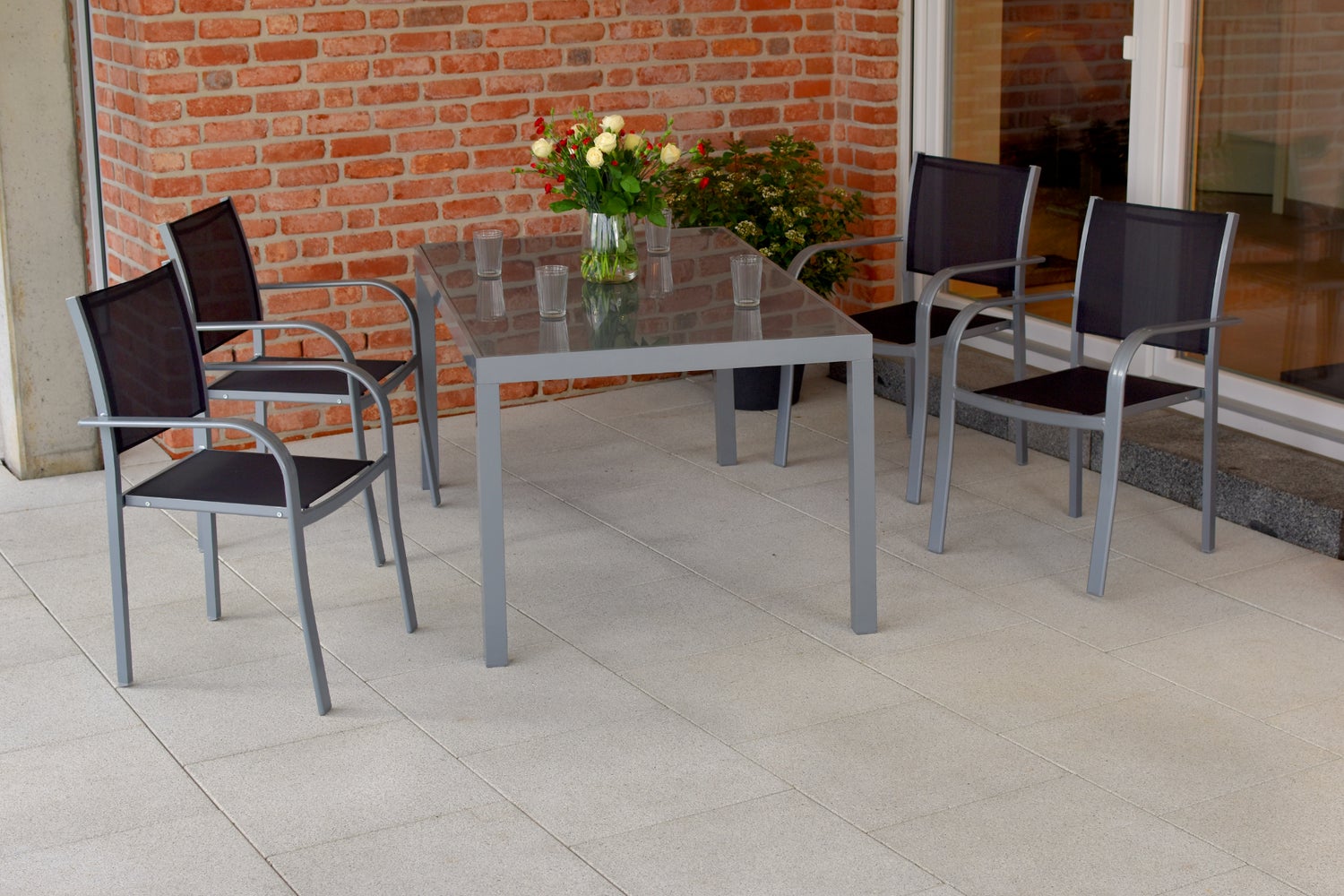 Ostia 5-delige tuinmeubelset, stapelbare stoelen, tafel 150 x 90 cm, zwart