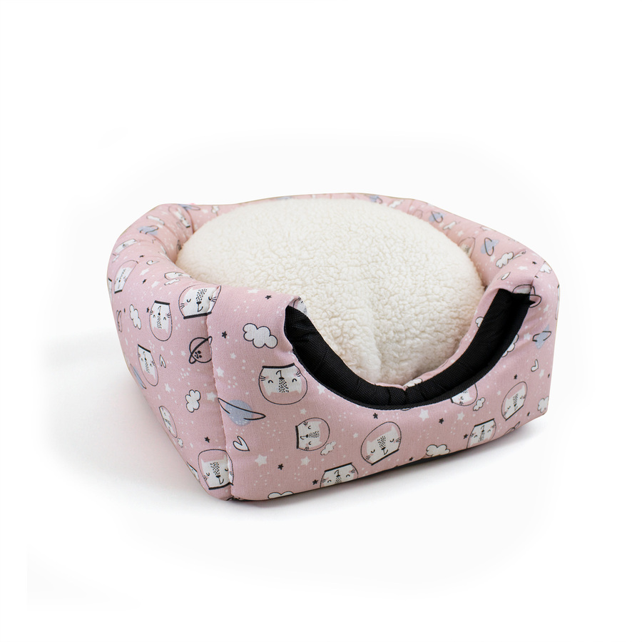 Cama em forma de caverna com estampa de quadrinhos rosa da Leeby para gatos.
