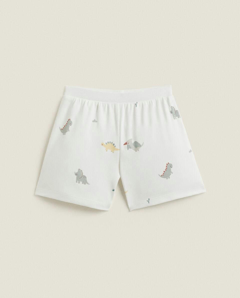 Conjunto de pijama infantil com estampa de dinossauro