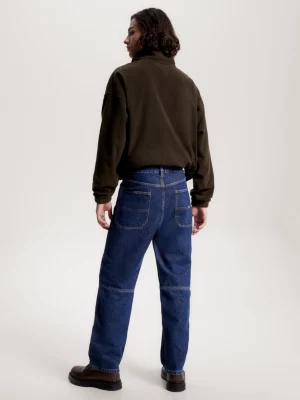 Calça jeans estilo skatista, modelagem ampla, ideal para trabalho.