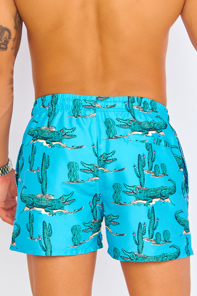 Short de bain bleu à motif crocodiles verts