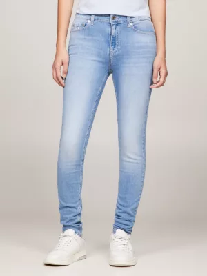 Calça jeans Nora de cintura média, skinny e desbotada.