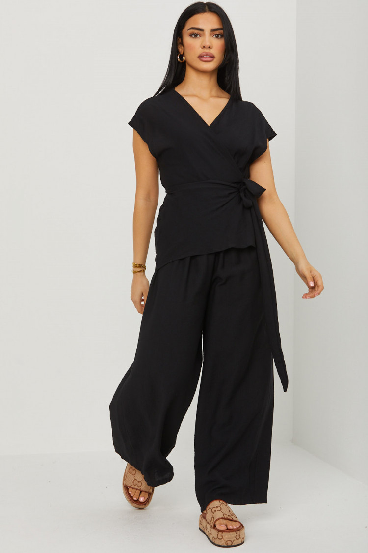 Combinaison pantalon noire décolleté croisé a noué