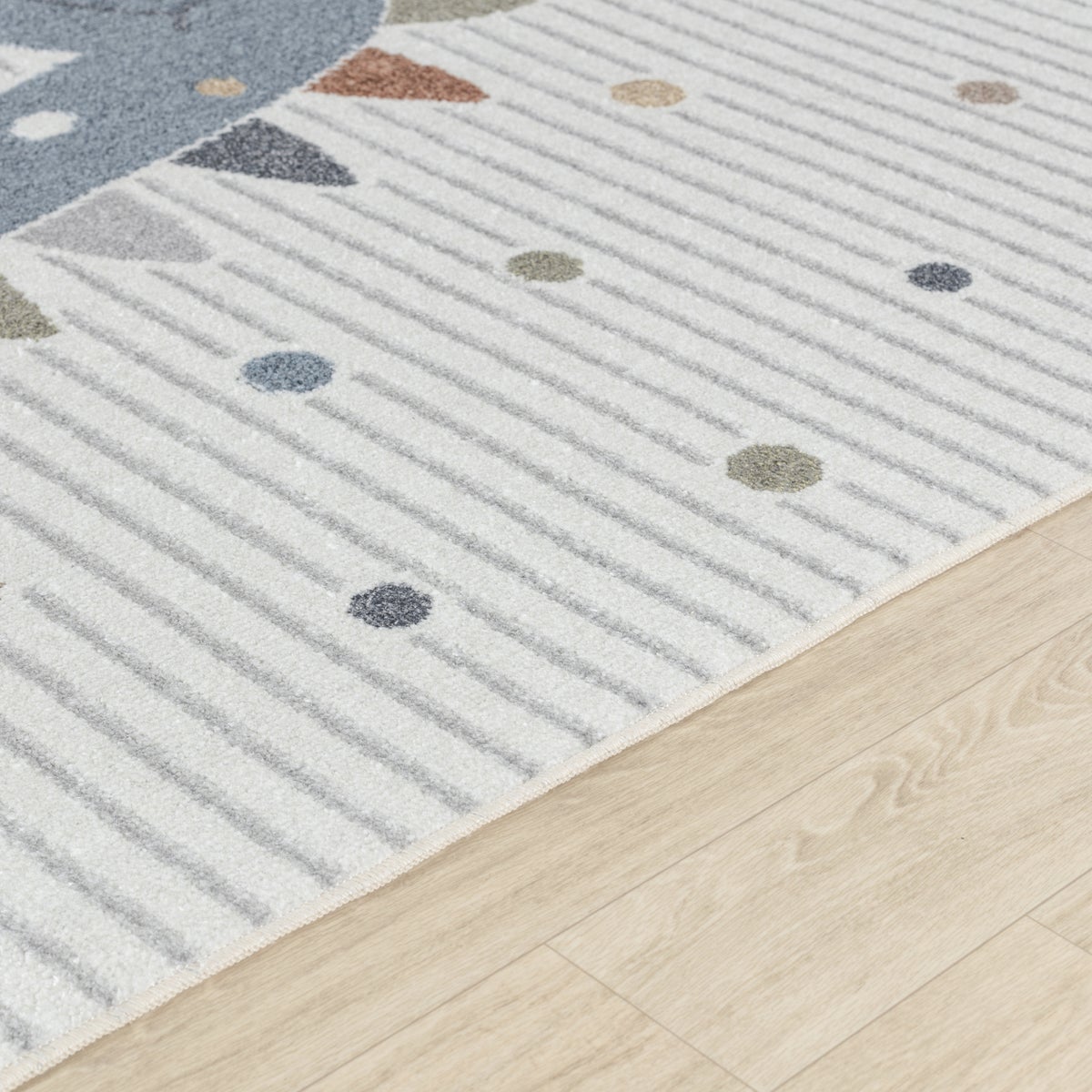 Machinewasbaar kinderkleed met dinosaurusmotief, beige/grijs, 80x150 cm.