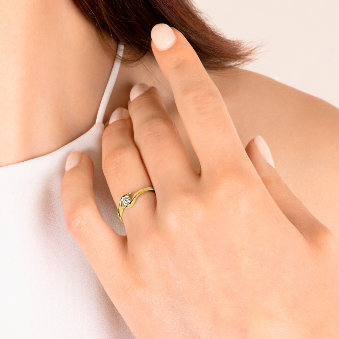 0.15 Karat Diamant Spannring 750/18 K Gelbgold