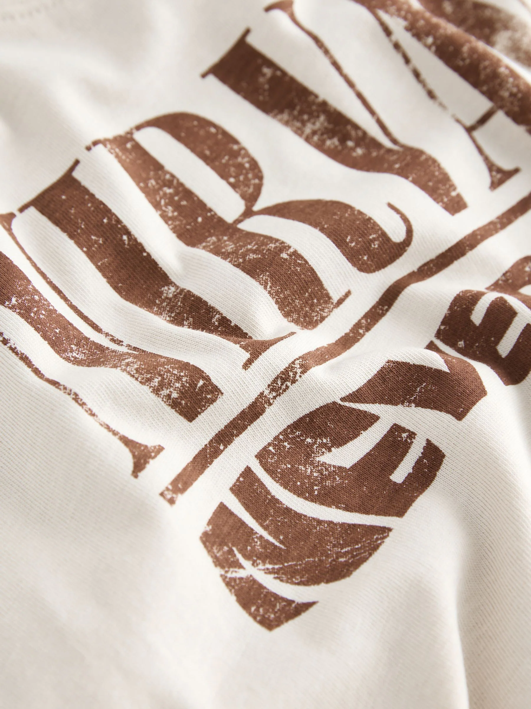 Crème Nirvana - T-shirt met korte mouwen en bandprint (3mnd -8jr)