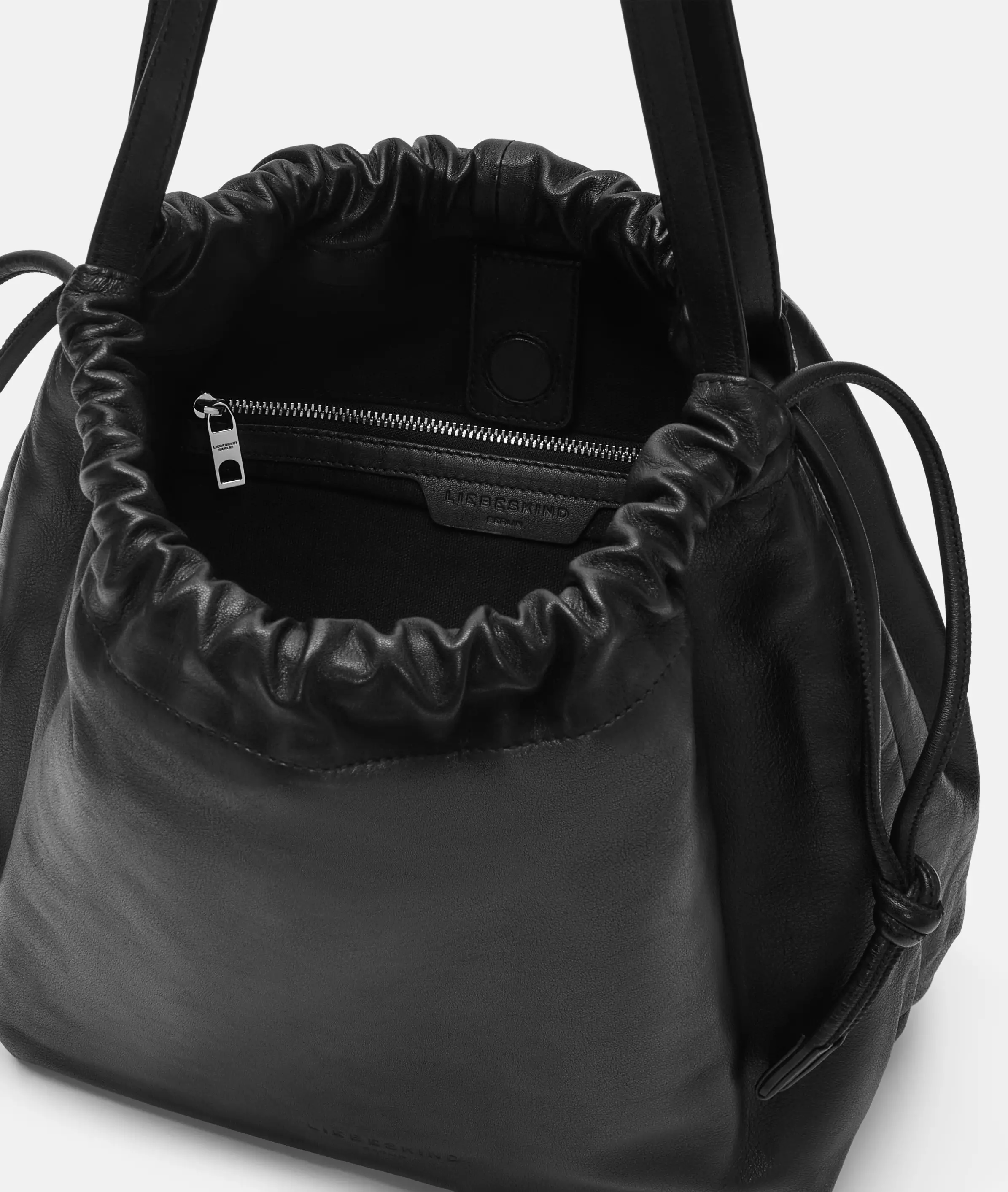 Lya Hobo M Spacious sheepskin pouch bag
