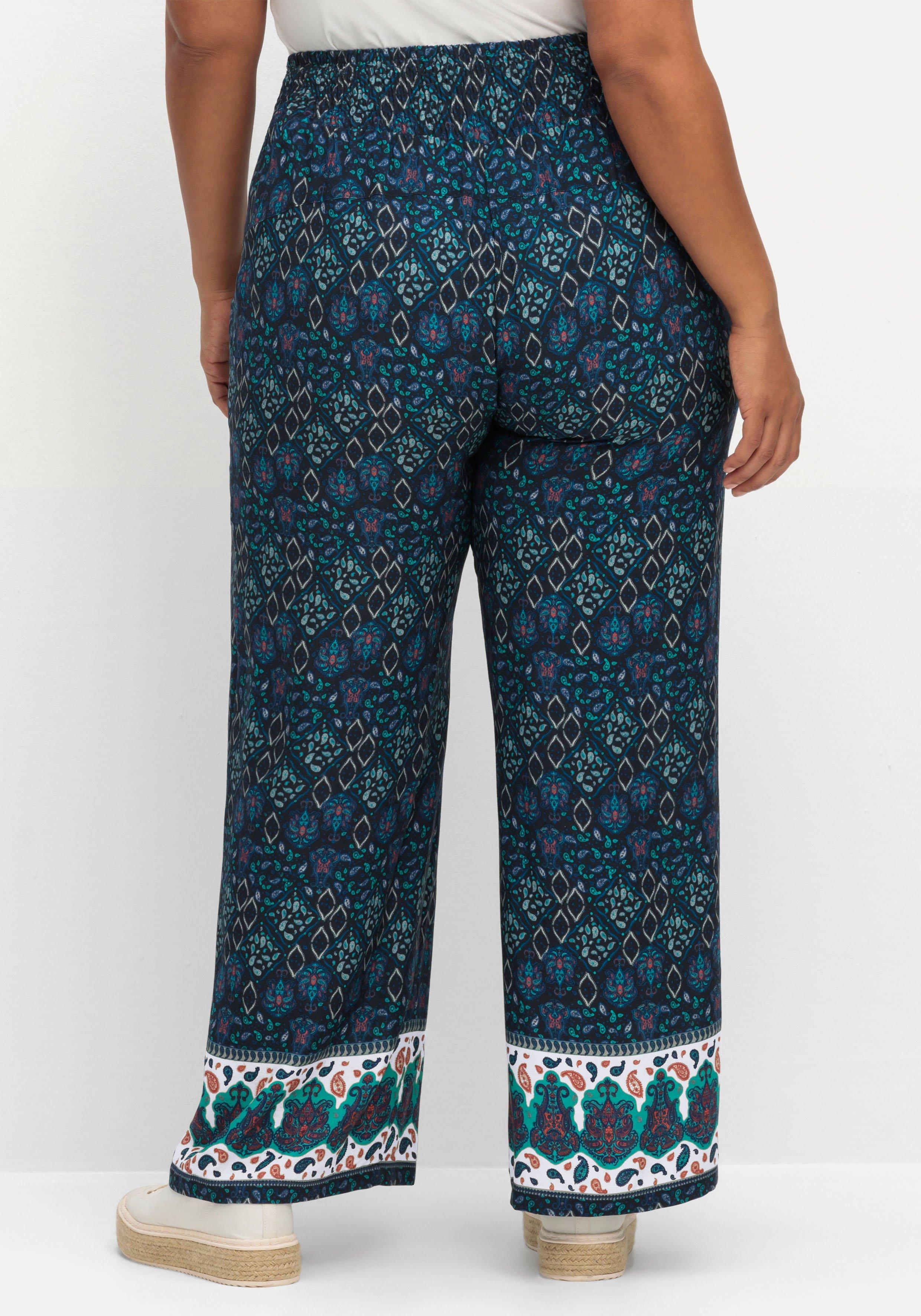 Weite Schlupfhose mit Alloverdruck und Smokbund