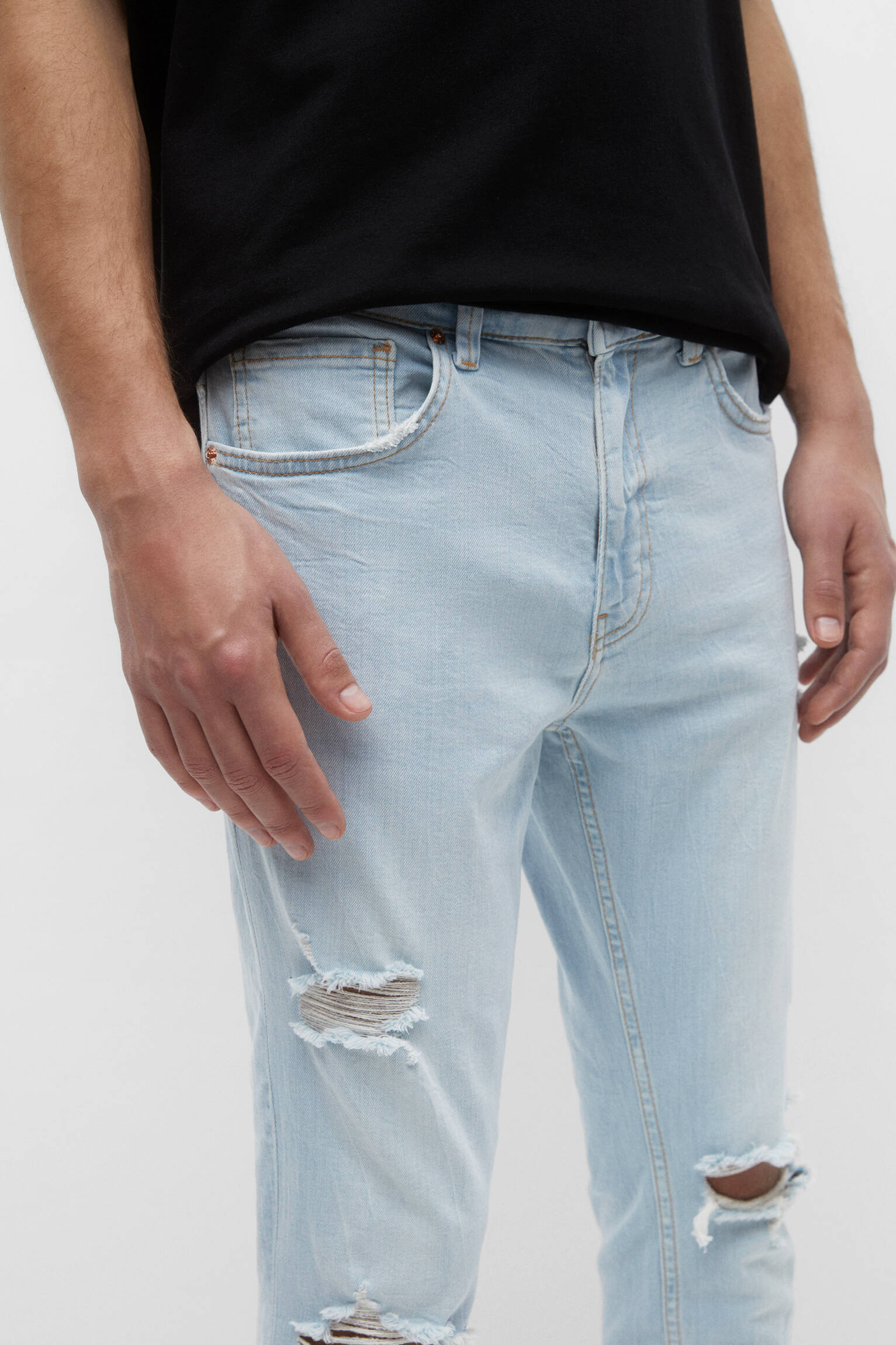 CALÇA JEANS SKINNY RASGADA - AZUL CLARO