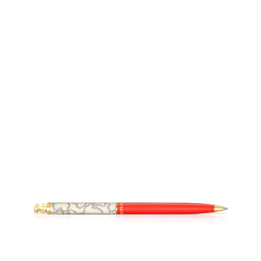 Caneta esferográfica TOUS Kaos em aço com revestimento IP dourado e acabamento laqueado em vermelho.