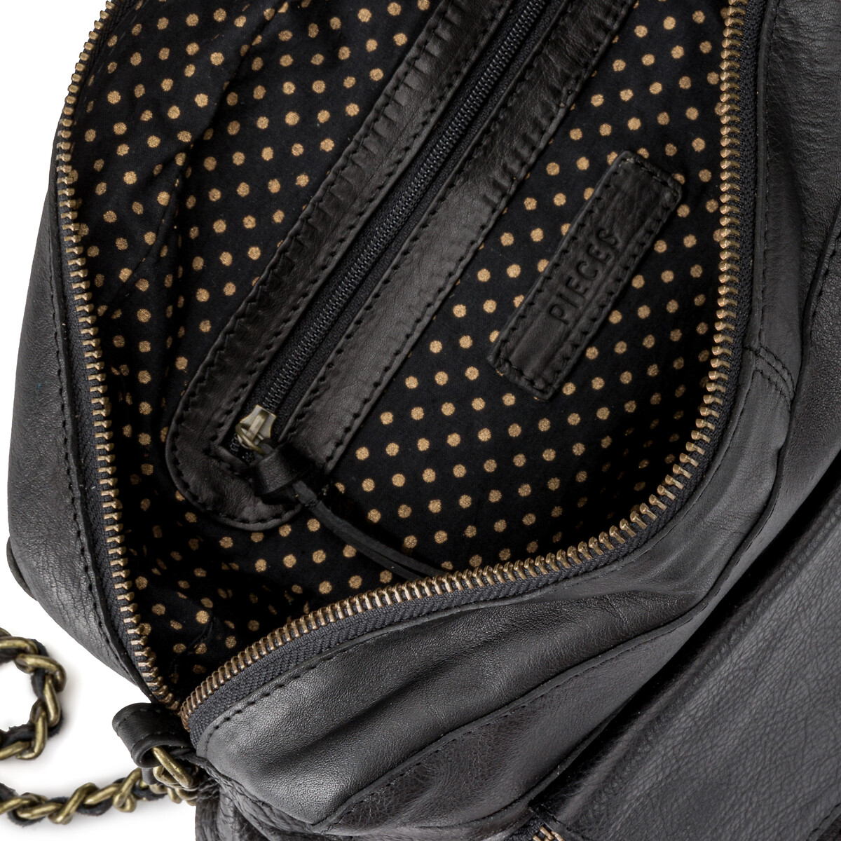 PEÇAS<br>Bolsa grande de couro Naina