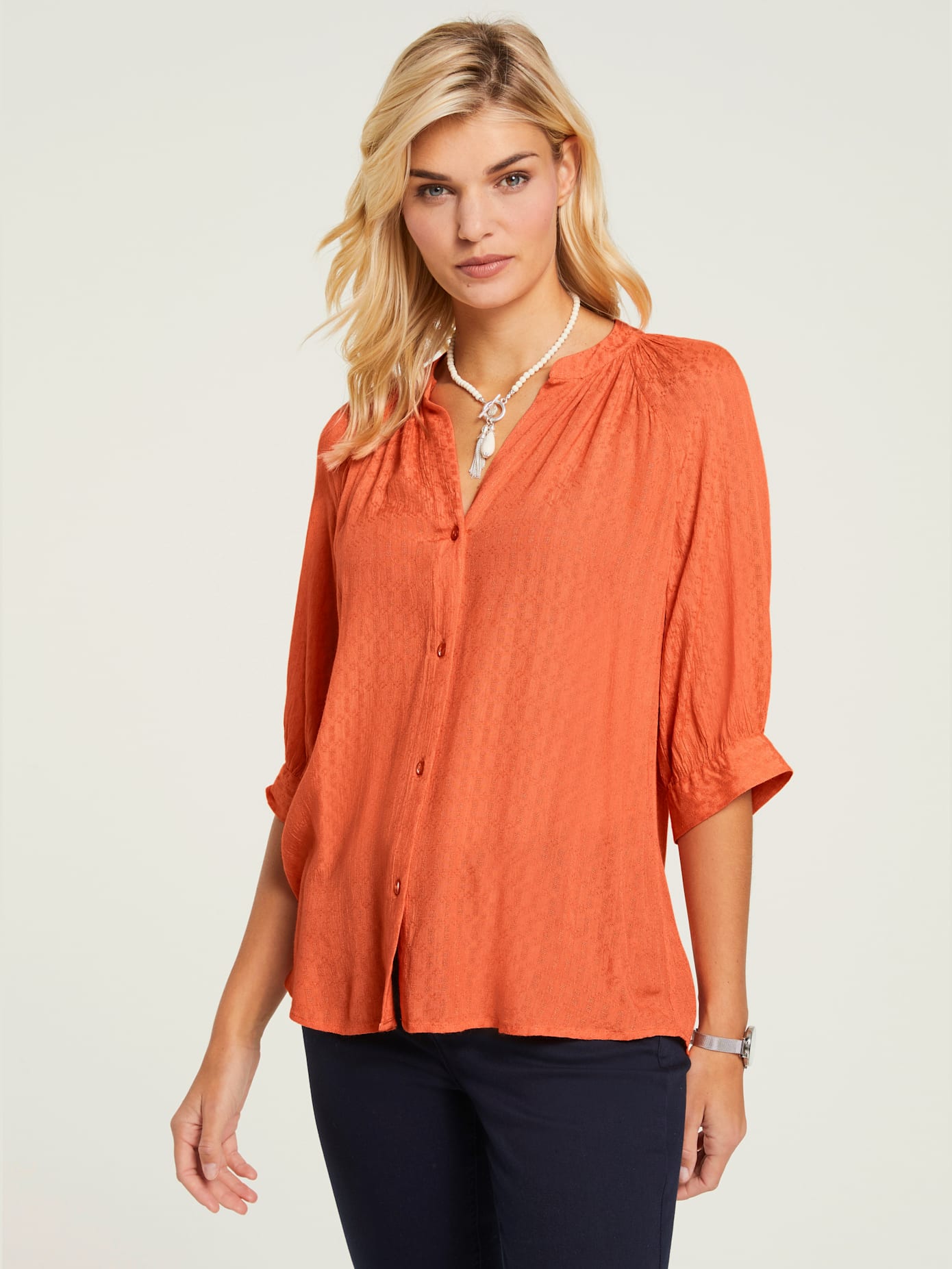 Chemisier look tendance avec ourlet arrondi