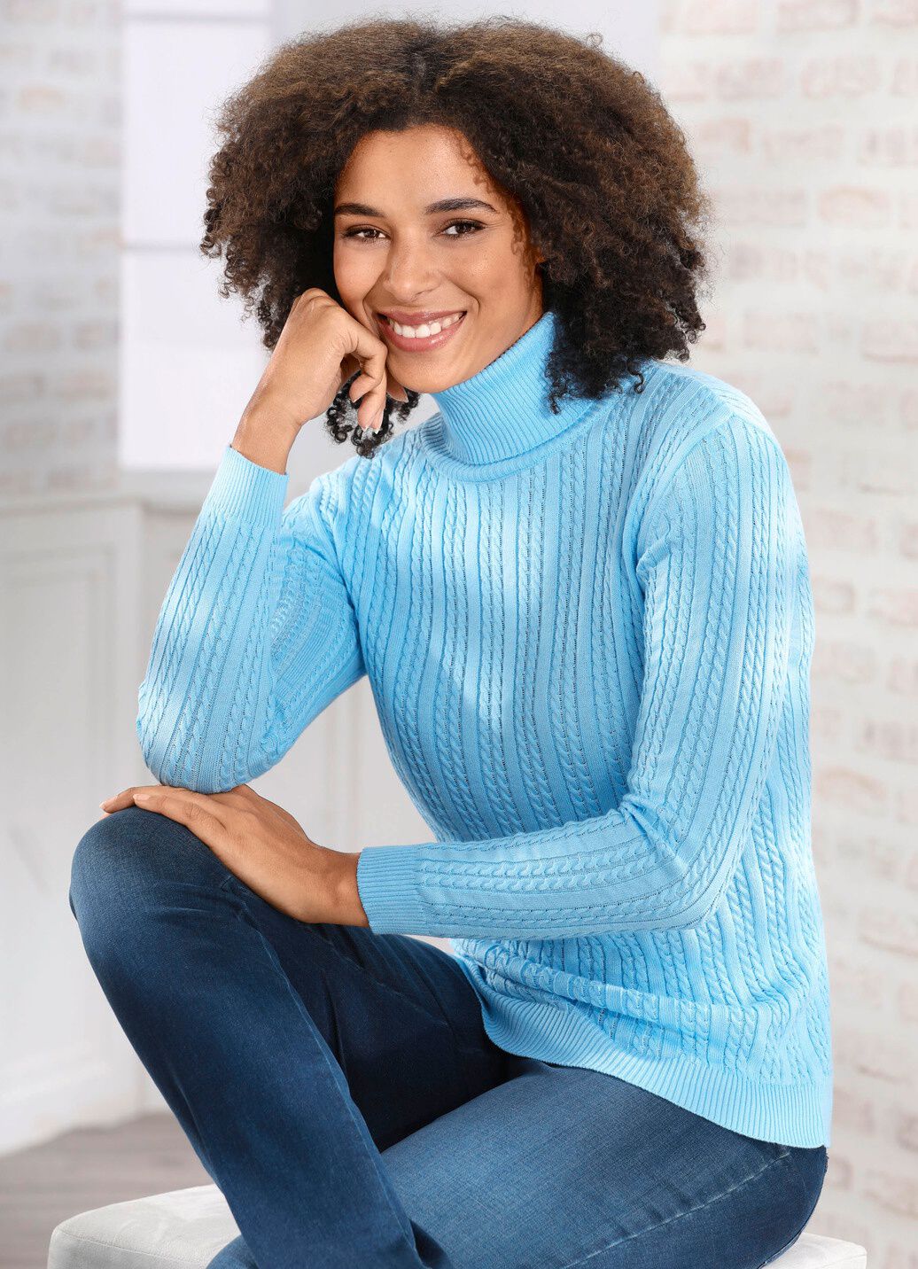 Pullover mit streckender Struktur