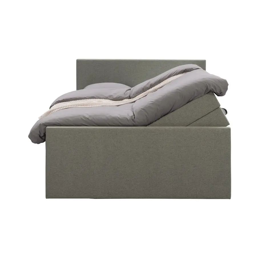 Boxspring met opbergruimte en voetbord Liv egaal - groen - 140x200cm