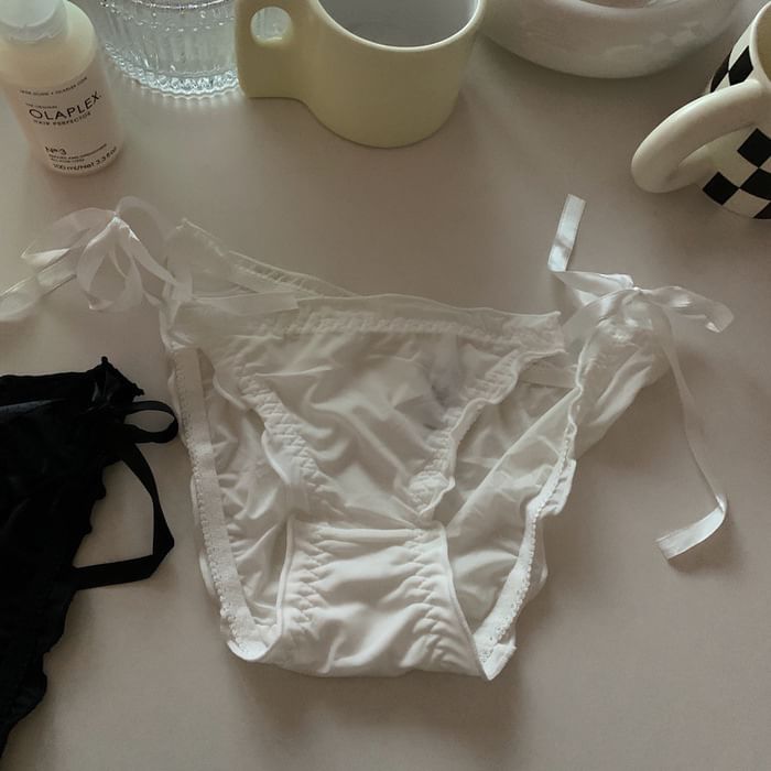 Fenmo - Effen mesh panty met knoopsluiting aan de zijkant