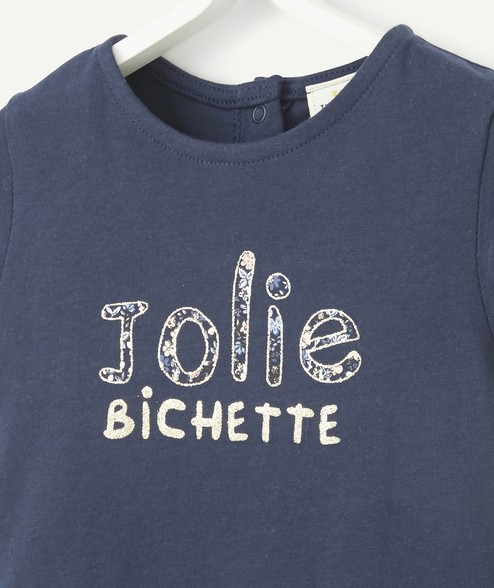 LE T-SHIRT MARINE EN COTON BIOLOGIQUE AVEC MESSAGE FLEURI ET PAILLETTÉ